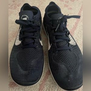 Navy blue Nike free run fly knit shoes